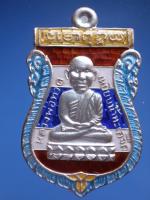 เหรียญหลวงพ่อทวดพิมพ์เสมาหัวโตเนื้อเงินลงยาเบญจรงค์สีธงชาติรุ่นพุทธาคมเขาอ้อปี2549