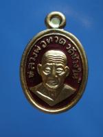 เหรียญหลวงพ่อทวดพิมพ์เม็ดแตงเนื้อทองแดงนอกลงยาราชาวดีสีแดงรุ่น101ปีอาจารย์ทิมปี56